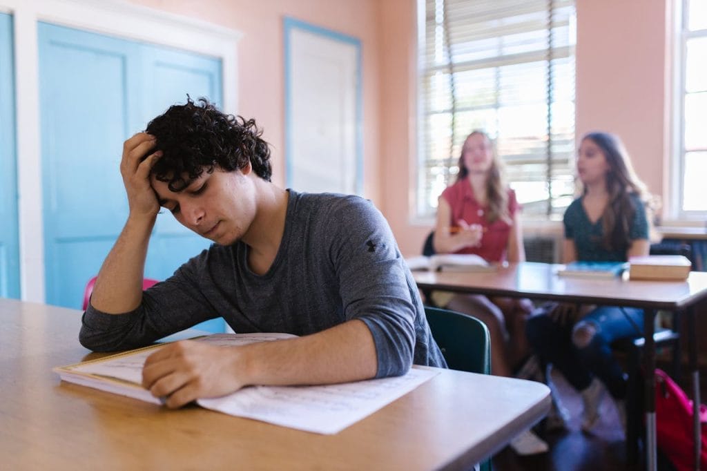male student worried about essay mistakes in exam